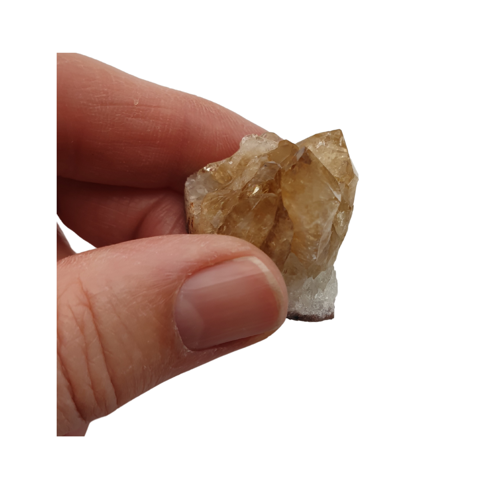 A hand holding a piece of Citrine with yellow points and white base