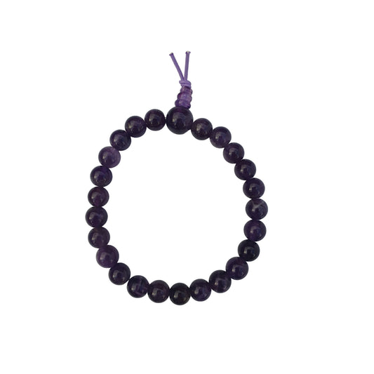 Amethyst bracelet with round purple beads on elastic